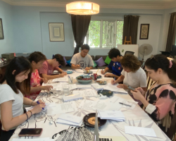 Writing hand-written get out the vote letters to be mailed to US voters who are less likely to vote