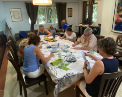 Writing hand-written get out the vote letters to be mailed to US voters who are less likely to vote